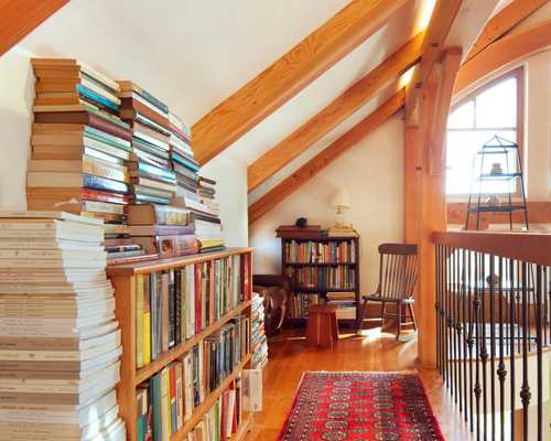 The living room of a timber frame home, which showcases the building's structure.