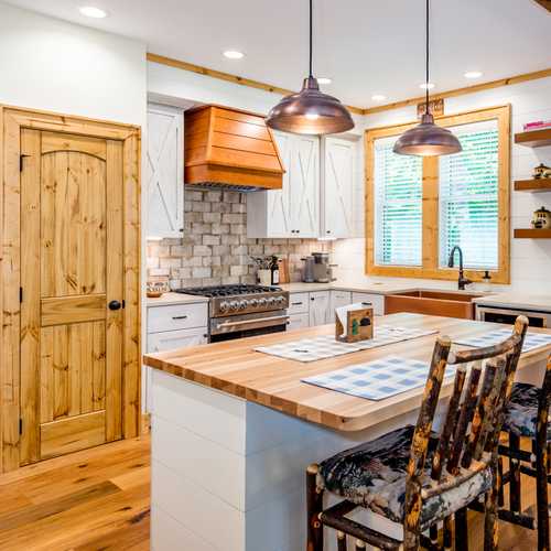 This kitchen expertly blends rustic and contemporary design.